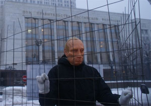 Маска Путина на марше несогласных в 2010 году